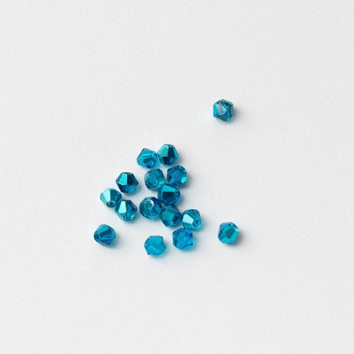 Fazetované sklenené korálky 4 mm modro zelená irisovaná